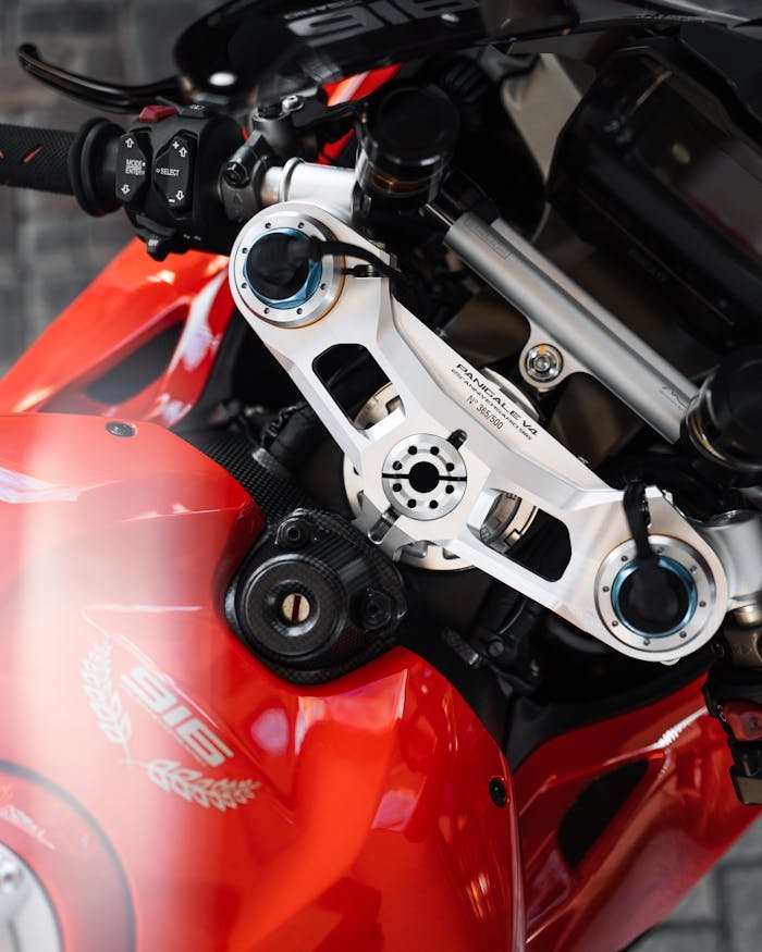 Detailed view of the Ducati Panigale handlebar and controls, highlighting modern design.